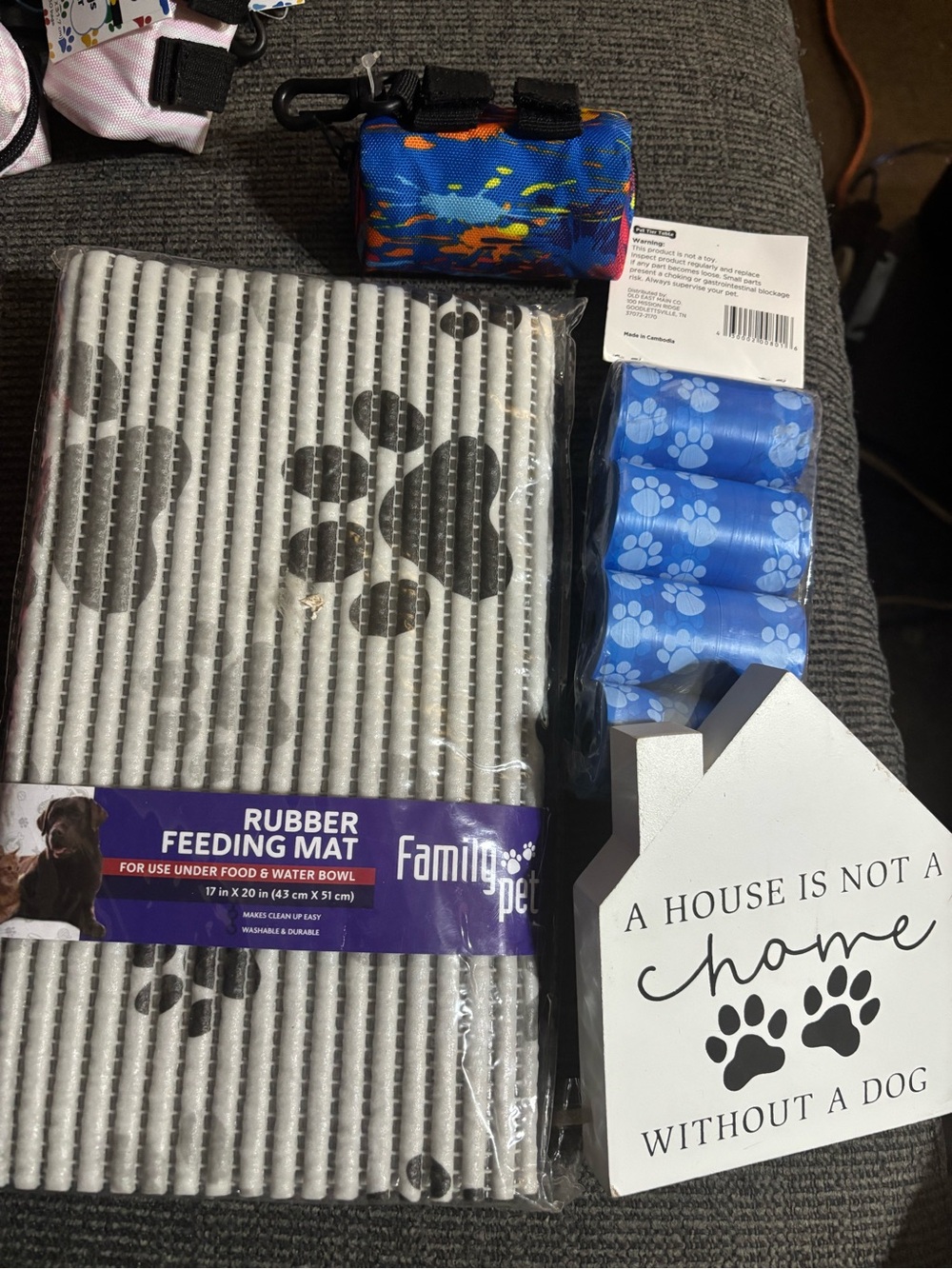 Pet Bundle: Feeding mat, poop bags and holder and decor House Is Not A Home
